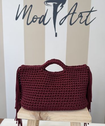 Borsa a mano con frange laterali